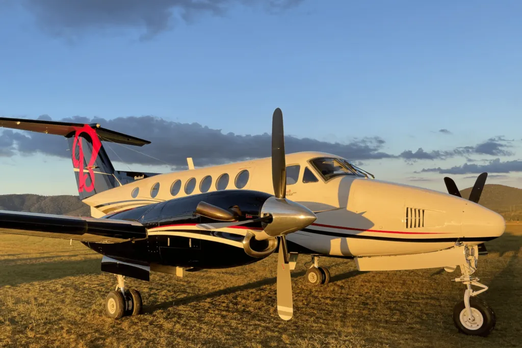 Beechcraft King Air B200 at sunset